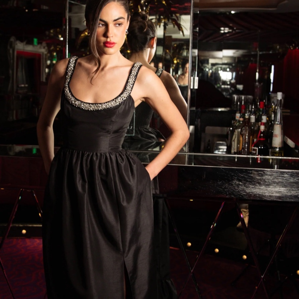 Elegant Black Dress with Embellished Straps
Designer- Hutch 
Worn once - size 4